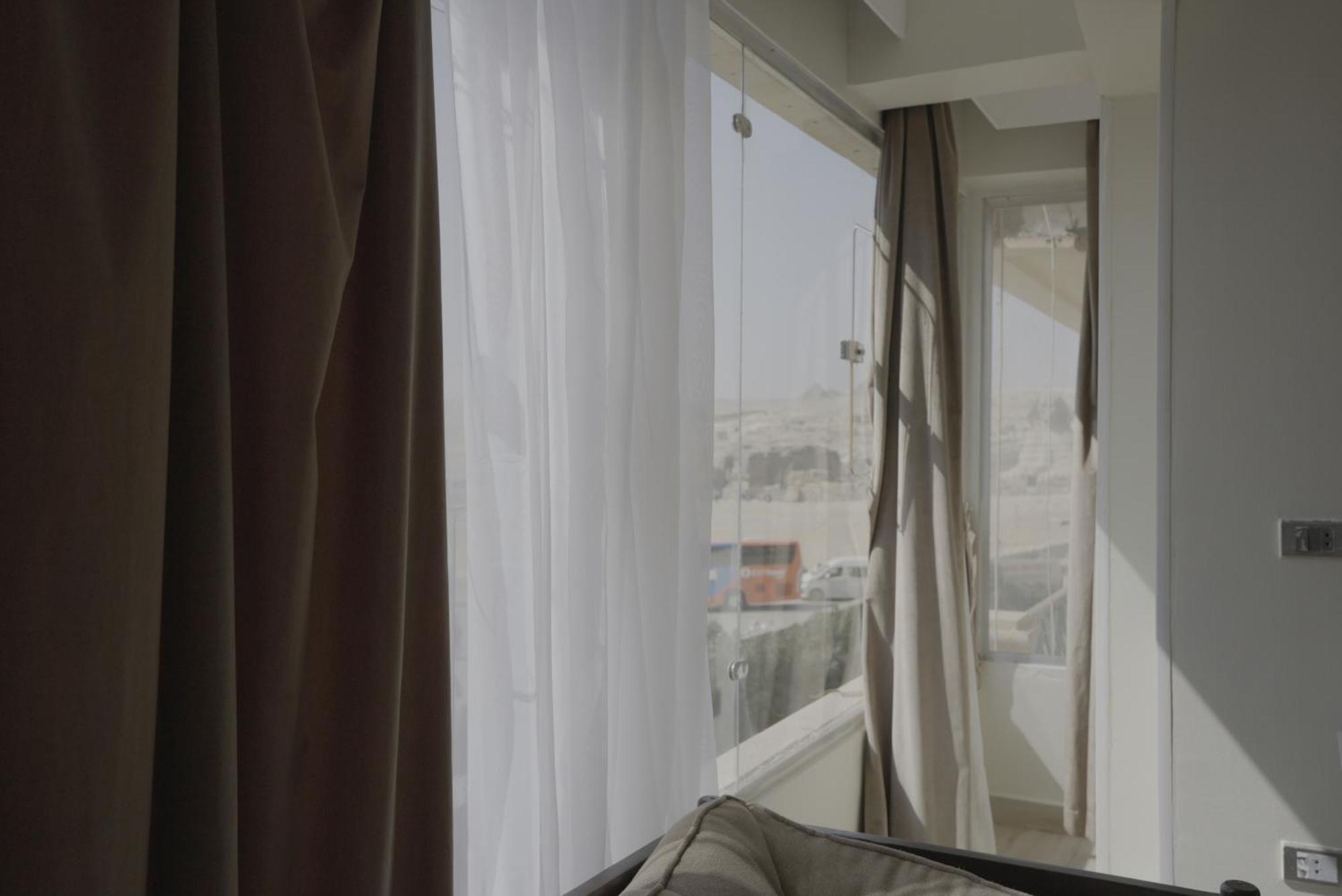 Queen Cleopatra Pyramids Hotel Кайро Екстериор снимка